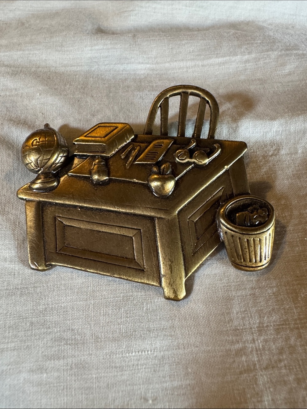 This is a vintage Jonette Jewelry (JJ) brooch w/a teacher's desk design